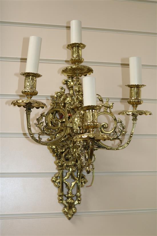 A pair of Victorian gilt brass four branch wall lights, rewired for electricity H.42cm